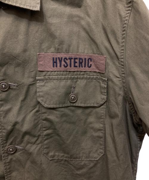 Hysteric Glamour（ヒステリックグラマー）Hysteric Glamour (ヒステリックグラマー) AMPLIFIED刺繍 ユーティリティシャツ オリーブ サイズ:SIZE XLの古着・服飾アイテム
