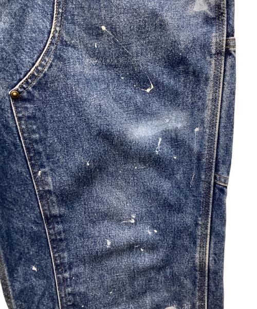 CarHartt（カーハート）CarHartt (カーハート) ペイント加工ダブルニーパンツ インディゴ サイズ:W34の古着・服飾アイテム