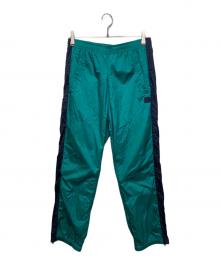 Acne studios（アクネ ストゥディオス）の古着「ナイロントラックパンツ」｜グリーン