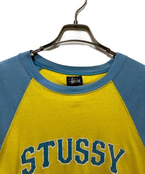 stussy（ステューシー）stussy (ステューシー) ラグランTEE ブルー×イエロー サイズ:Mの古着・服飾アイテム