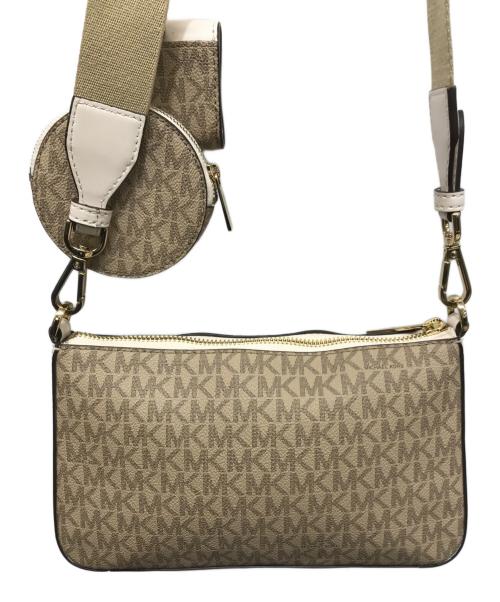 MICHAEL KORS（マイケル・コース）MICHAEL KORS (マイケル・コース) ジェットセットトラベルPVCウィズテックアタッチスモール ベージュの古着・服飾アイテム