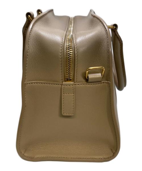 Saint Laurent Paris（サンローランパリ）Saint Laurent Paris (サンローランパリ) ダッフルロック 2WAYハンドバッグ ベージュの古着・服飾アイテム