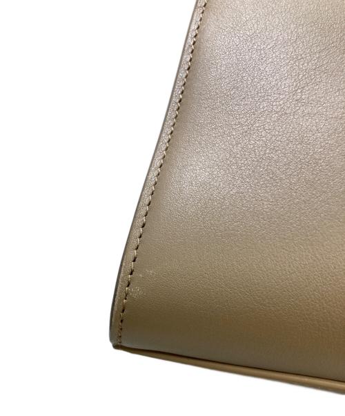 Saint Laurent Paris（サンローランパリ）Saint Laurent Paris (サンローランパリ) ダッフルロック 2WAYハンドバッグ ベージュの古着・服飾アイテム