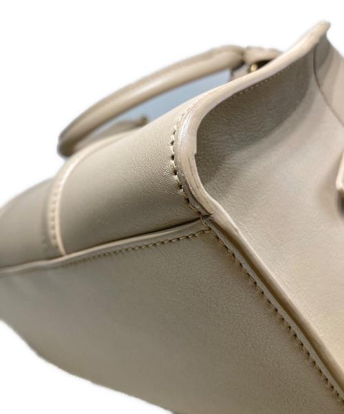 Saint Laurent Paris（サンローランパリ）Saint Laurent Paris (サンローランパリ) ダッフルロック 2WAYハンドバッグ ベージュの古着・服飾アイテム