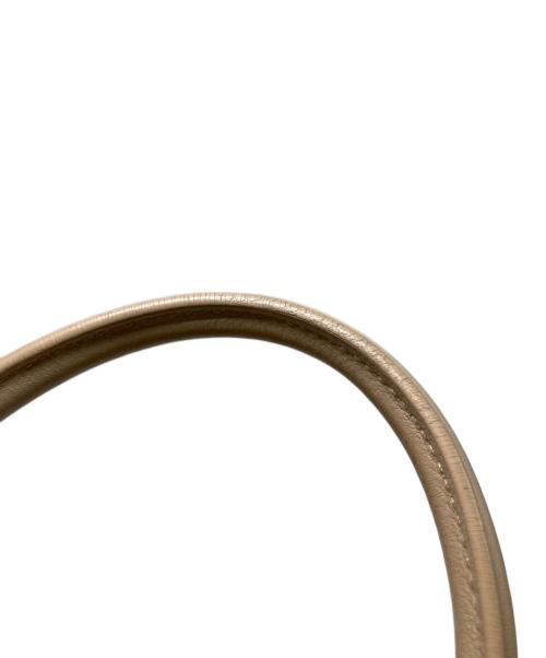 Saint Laurent Paris（サンローランパリ）Saint Laurent Paris (サンローランパリ) ダッフルロック 2WAYハンドバッグ ベージュの古着・服飾アイテム