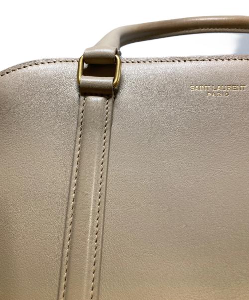 Saint Laurent Paris（サンローランパリ）Saint Laurent Paris (サンローランパリ) ダッフルロック 2WAYハンドバッグ ベージュの古着・服飾アイテム