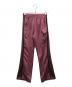 Needles（ニードルズ）の古着「Boots Cut Track Pant」｜ピンク