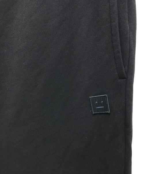 Acne studios（アクネ ストゥディオズ）Acne studios (アクネ ストゥディオズ) フェイスロゴスウェットパンツ ブラック サイズ:Sの古着・服飾アイテム