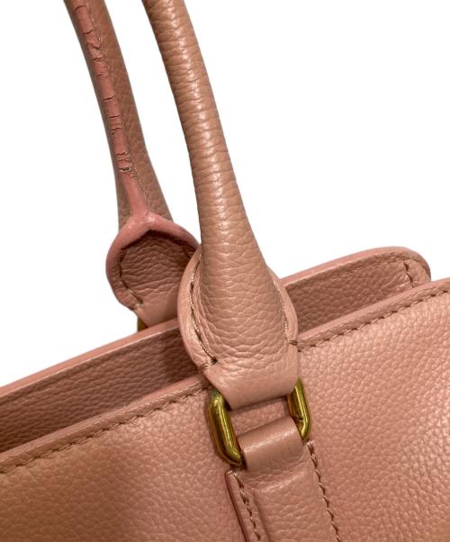 ALEXANDER McQUEEN（アレキサンダーマックイーン）ALEXANDER McQUEEN (アレキサンダーマックイーン) Calfskin Small Skull Padlock Zip Around Tote ピンクの古着・服飾アイテム