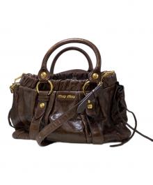 MIU MIU（ミュウミュウ）の古着「サイドリボン2WAY ハンドバッグ」｜ブラウン