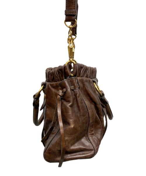 MIU MIU（ミュウミュウ）MIU MIU (ミュウミュウ) サイドリボン2WAY ハンドバッグ ブラウンの古着・服飾アイテム