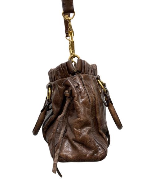 MIU MIU（ミュウミュウ）MIU MIU (ミュウミュウ) サイドリボン2WAY ハンドバッグ ブラウンの古着・服飾アイテム