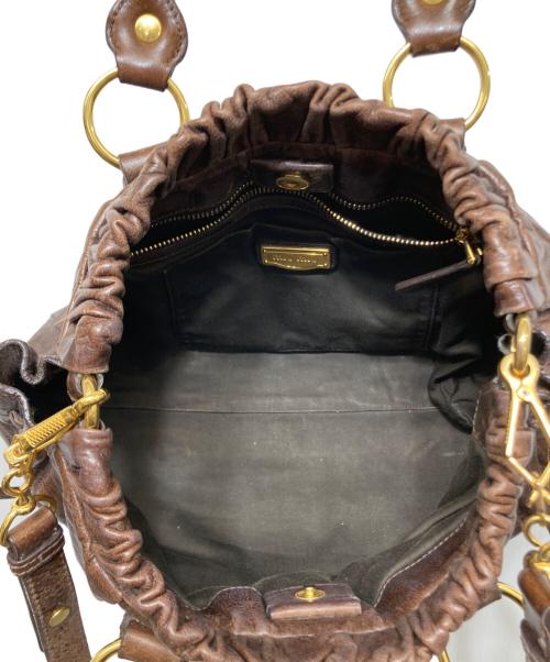 MIU MIU（ミュウミュウ）MIU MIU (ミュウミュウ) サイドリボン2WAY ハンドバッグ ブラウンの古着・服飾アイテム