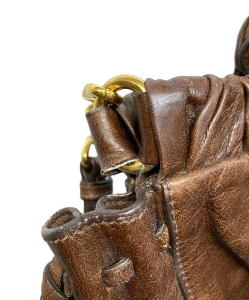 MIU MIU（ミュウミュウ）MIU MIU (ミュウミュウ) サイドリボン2WAY ハンドバッグ ブラウンの古着・服飾アイテム