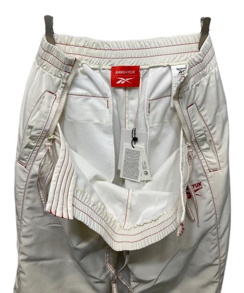 KANGHYUK（カンヒョク）KANGHYUK (カンヒョク) REEBOK (リーボック) ナイロンパンツ ホワイト サイズ:Ⅼの古着・服飾アイテム