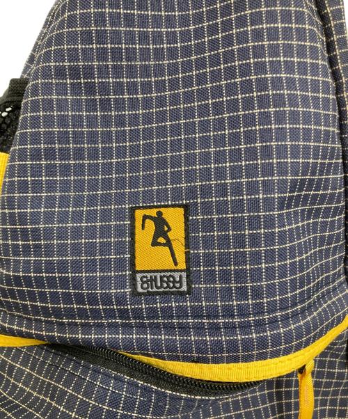 stussy（ステューシー）stussy (ステューシー) スリングバッグ ネイビー×イエローの古着・服飾アイテム