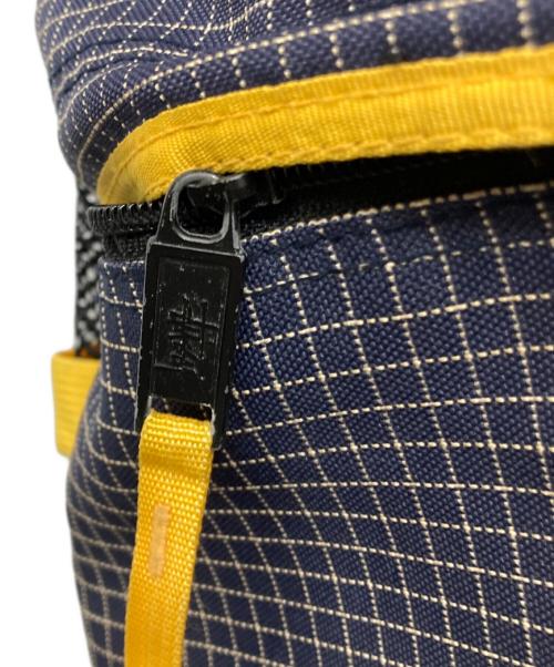 stussy（ステューシー）stussy (ステューシー) スリングバッグ ネイビー×イエローの古着・服飾アイテム