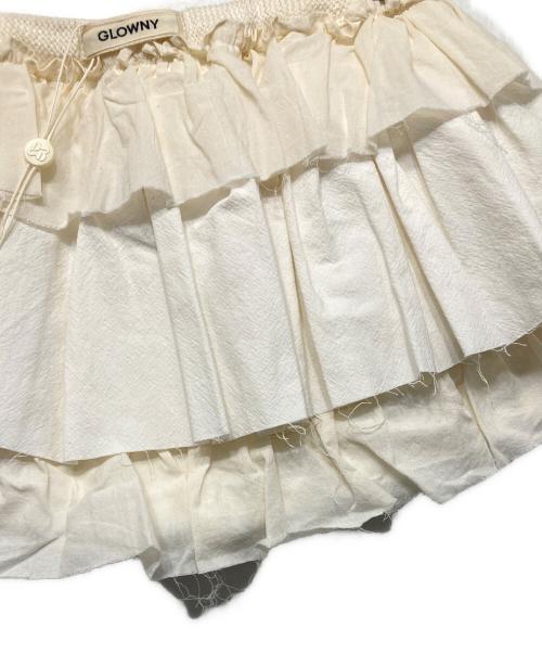 GLOWNY（グロウニー）GLOWNY (グロウニー) GIRLFRIEND RUFFLE MINI SKIRT ホワイト サイズ:S 未使用品の古着・服飾アイテム