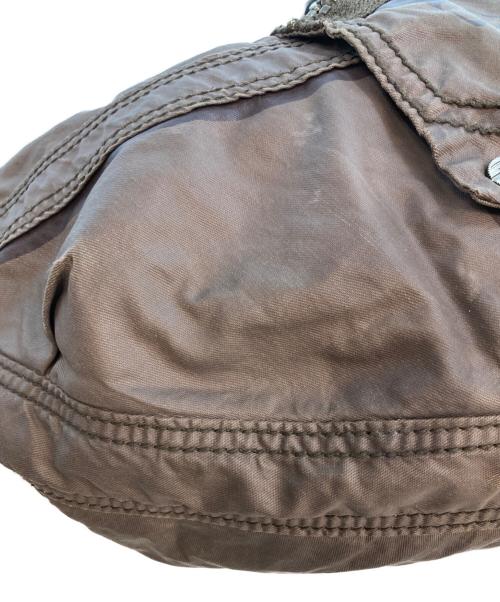 DIESEL（ディーゼル）DIESEL (ディーゼル) ハーフムーンショルダーバッグ ブラウンの古着・服飾アイテム