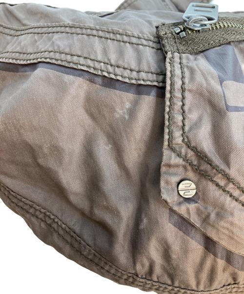 DIESEL（ディーゼル）DIESEL (ディーゼル) ハーフムーンショルダーバッグ ブラウンの古着・服飾アイテム