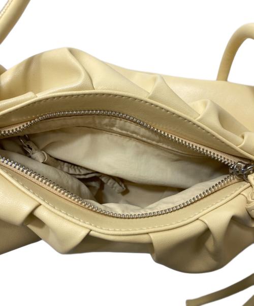 olend（オレンド）OLEND (オレンド) Dumpling Bag イエローの古着・服飾アイテム