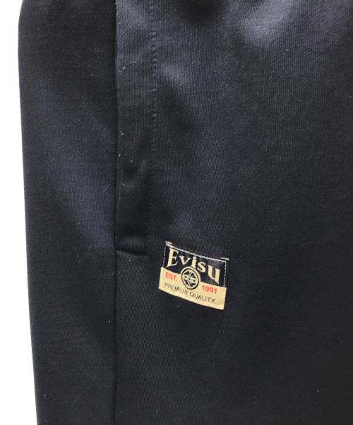 EVISU（エヴィス）EVISU (エヴィス) Poster Daicock Print Fashion Fit Sweatpants/ポスターダイコックプリントファッションフィットスウェットパンツ ネイビー サイズ:XLの古着・服飾アイテム