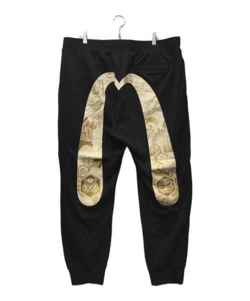 EVISU（エヴィス）EVISU (エヴィス) カモメと鶴の恩返し大黒プリント レギュラーフィットスウェットパンツ ブラック サイズ:XXLの古着・服飾アイテム