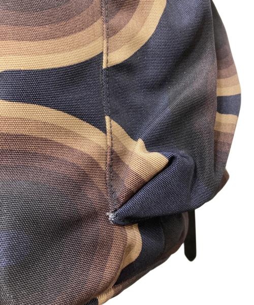 DRIES VAN NOTEN（ドリスヴァンノッテン）DRIES VAN NOTEN (ドリスヴァンノッテン) Verner Panton (ベルナーパントン) ウェーブ柄バックパック ネイビー×ブラウンの古着・服飾アイテム