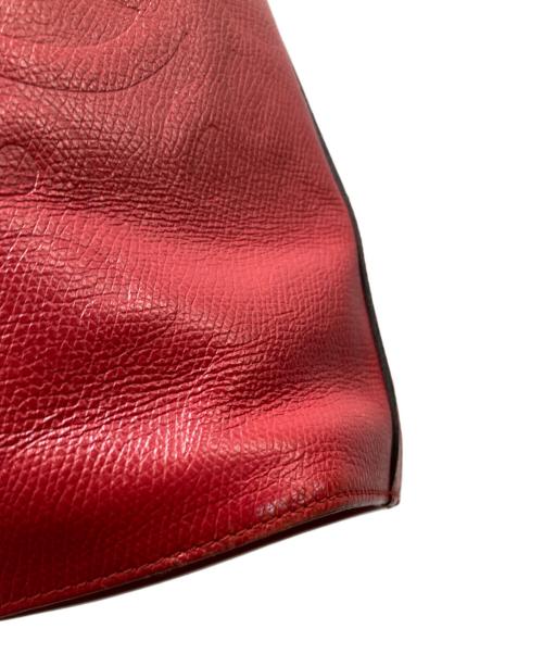 Yves Saint Laurent（イヴサンローラン）Yves Saint Laurent (イヴサンローラン) 巾着レザーショルダーバッグ レッドの古着・服飾アイテム