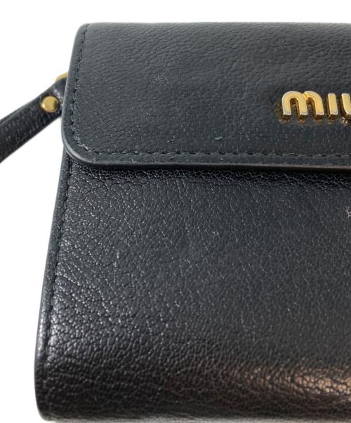MIU MIU（ミュウミュウ）MIU MIU (ミュウミュウ) 2つ折り財布 ブラックの古着・服飾アイテム