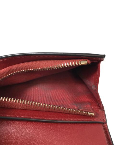 VALENTINO（ヴァレンティノ）VALENTINO (ヴァレンティノ) スタッズ折りたたみ財布 レッドの古着・服飾アイテム