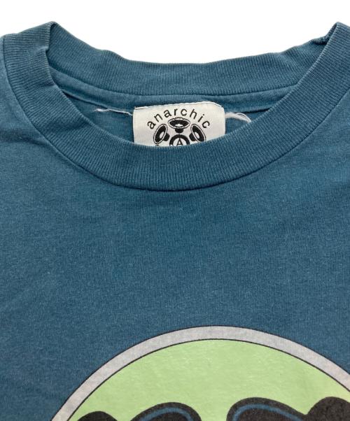 ANARCHIC ADJUSTMENT（アナーキック・アジャストメント）ANARCHIC ADJUSTMENT (アナ-キックアジャストメント) Tシャツ ブルー サイズ:表記無の古着・服飾アイテム