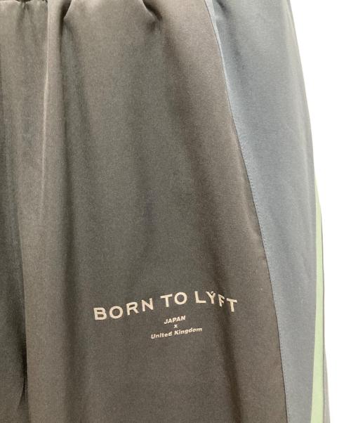 Lyft（リフト）Lyft (リフト) 2Line Adjustable Wide Track Pants/2ライン アドジャステーブル ワイド トラック パンツ ブラック サイズ:Ｍの古着・服飾アイテム