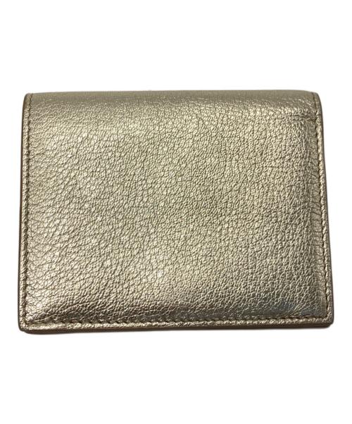 MIU MIU（ミュウミュウ）MIU MIU (ミュウミュウ) 2つ折り財布 ゴールドの古着・服飾アイテム