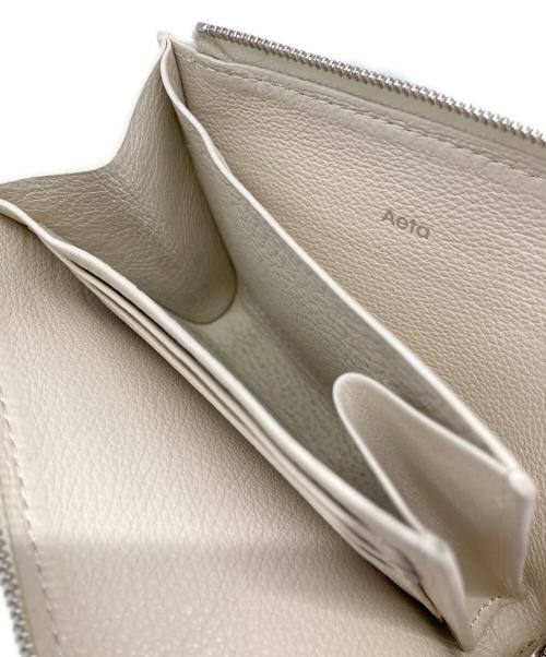 Aeta（アエタ）Aeta (アエタ) L字ジップファスナーウォレット ホワイトの古着・服飾アイテム