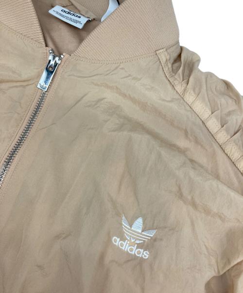 adidas（アディダス）adidas (アディダス) ナイロンジャケット ベージュ サイズ:Sの古着・服飾アイテム