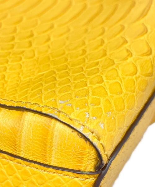 MICHAEL KORS（マイケル・コース）MICHAEL KORS (マイケル・コース) エクストラスモール リュック イエローの古着・服飾アイテム