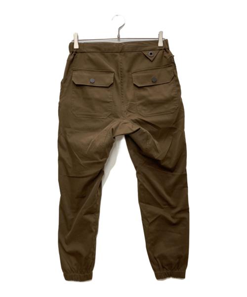 WHITE MOUNTAINEERING（ホワイトマウンテ二アニング）WHITE MOUNTAINEERING (ホワイトマウンテ二アニング) Twilled Stretch Jogger Pants/ツイルド ストレッチ ジョガー パンツ ブラウンの古着・服飾アイテム
