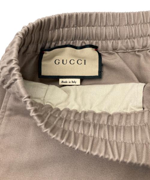 GUCCI（グッチ）GUCCI (グッチ) ワッペンロゴイージーパンツ ベージュ サイズ:46の古着・服飾アイテム