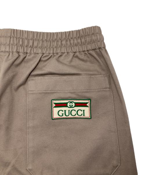 GUCCI（グッチ）GUCCI (グッチ) ワッペンロゴイージーパンツ ベージュ サイズ:46の古着・服飾アイテム