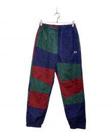 stussy（ステューシー）の古着「Panel Track パンツ/パネルトラックパンツ」｜マルチカラー