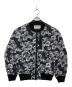 Onitsuka Tiger（オニツカタイガー）の古着「総柄ボンバージャケット」｜ブラック×ホワイト