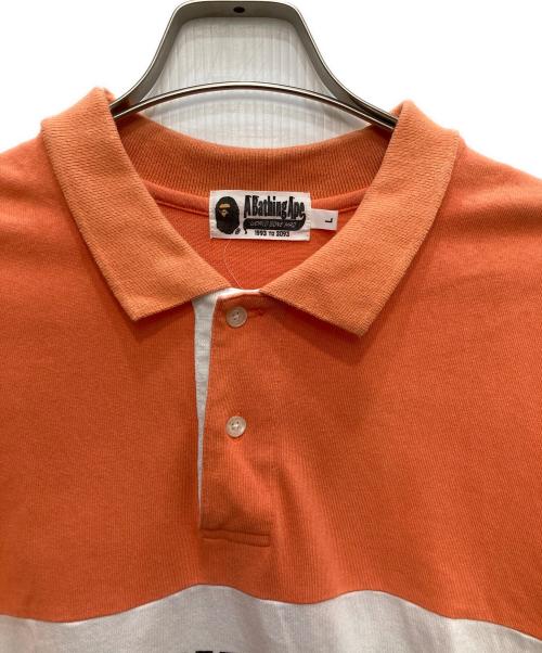 A BATHING APE（アベイシングエイプ）A BATHING APE (アベイシングエイプ) ポロシャツ オレンジ サイズ:Lの古着・服飾アイテム
