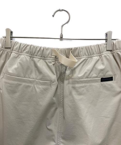 GRAMICCI（グラミチ）GRAMICCI (グラミチ) ESTNATION (エストネーション) ストレッチセンタープレスパンツ ベージュ サイズ:Ｍの古着・服飾アイテム