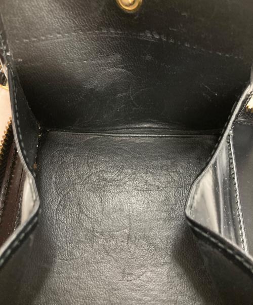 COMME des GARCONS（コムデギャルソン）COMME des GARCONS (コムデギャルソン) POLKA DOTS EMBOSSED FULL ZIP AROUND WALLET ブラックの古着・服飾アイテム