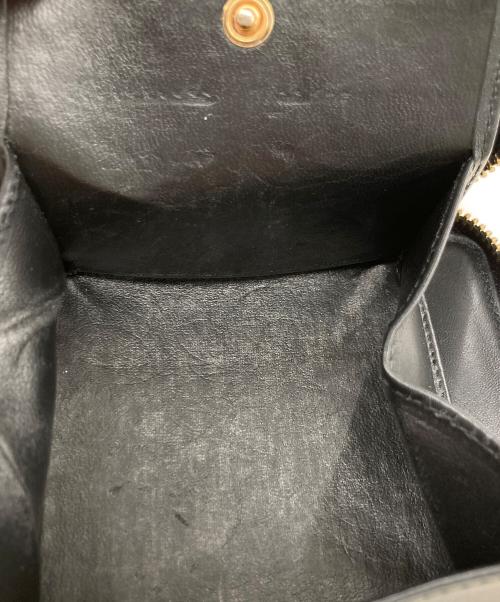 COMME des GARCONS（コムデギャルソン）COMME des GARCONS (コムデギャルソン) エンボスフォレスト 二つ折り財布 ブラックの古着・服飾アイテム