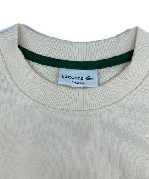 LACOSTE（ラコステ）LACOSTE (ラコステ) ヘリテージワッペンクルーネックスウェット アイボリー サイズ:Mの古着・服飾アイテム