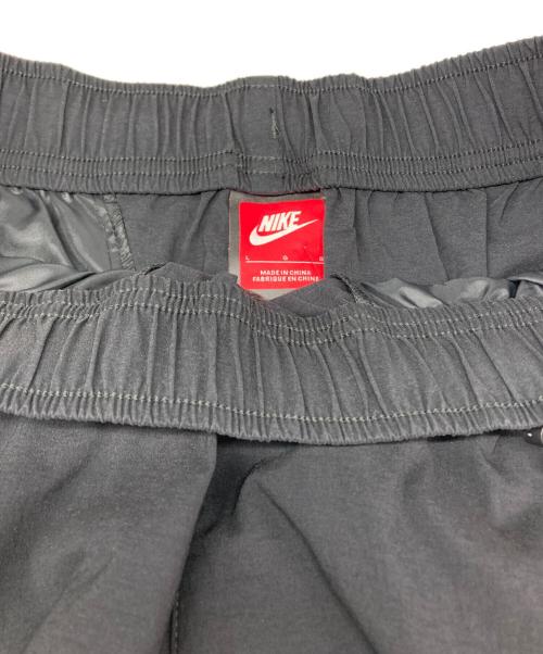 NIKE（ナイキ）NIKE (ナイキ) TECH WOVEN OPEN HEM PANT ブラック サイズ:L 未使用品の古着・服飾アイテム