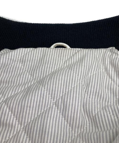 Thom Browne（トムブラウン）Thom Browne (トムブラウン) スタジャン ネイビーの古着・服飾アイテム