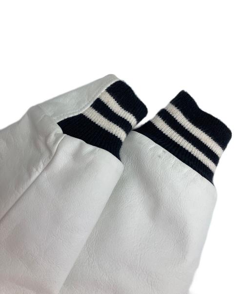 Thom Browne（トムブラウン）Thom Browne (トムブラウン) スタジャン ネイビーの古着・服飾アイテム